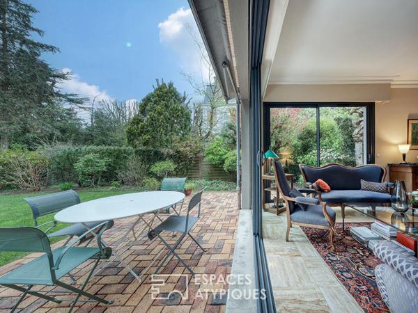 Maison meulière rénovée avec jardin et extensions dans un quartier recherché de Soisy-sur-Seine