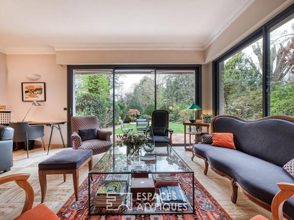 Maison meulière rénovée avec jardin et extensions dans un quartier recherché de Soisy-sur-Seine