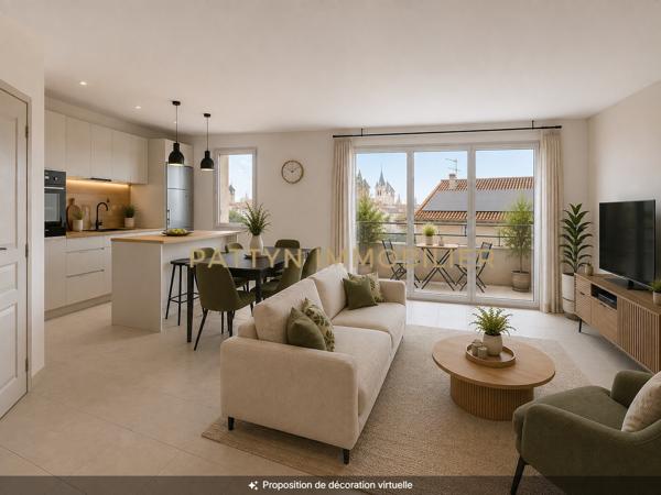 Un dernier étage avec ascenseur, cave, balcon et vue dégagée, au cœur du village