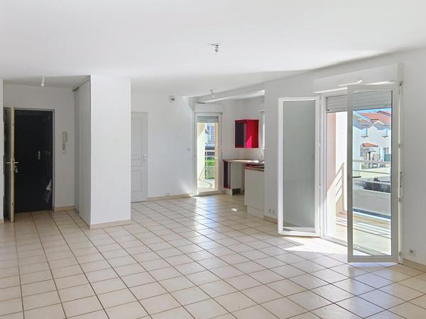 T4 100 m² + double garage au cœur du village