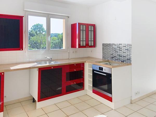 T4 100 m² + double garage au cœur du village