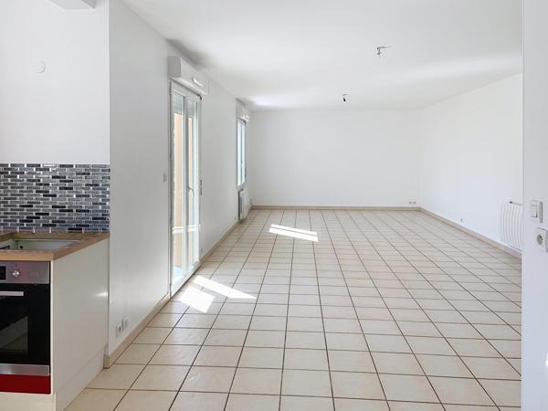 T4 100 m² + double garage au cœur du village
