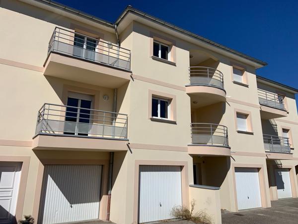 T4 100 m² + double garage au cœur du village