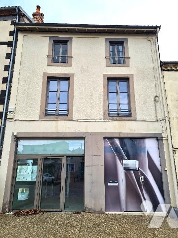 Immeuble avec local commercial libre.