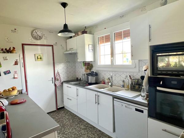 Maison individuelle - 4 chambres - garage - jardin