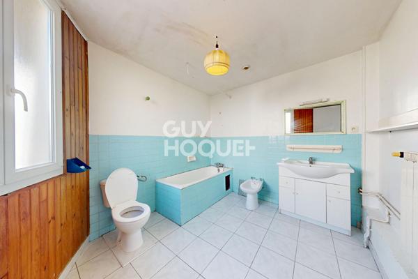 Maison de ville 149 m² au coeur historique d'Hagetmau avec beau potentiel