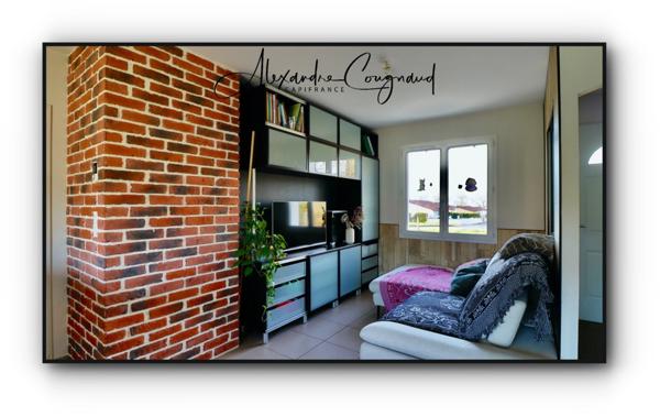 A vendre maison de plain-pied RT2012 de 84 m² avec 3 chambres, jardin et carport