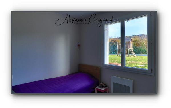 A vendre maison de plain-pied RT2012 de 84 m² avec 3 chambres, jardin et carport