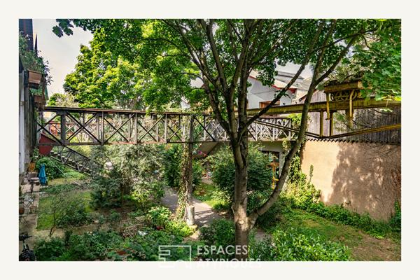 Loft d’architecte en duplex et dernier étage sur jardin luxuriant