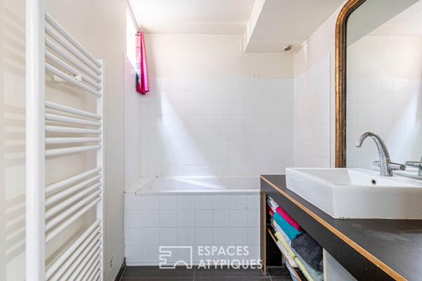 Loft d’architecte en duplex et dernier étage sur jardin luxuriant