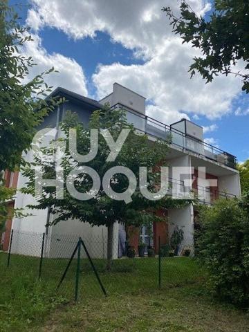 2 pièces - double garage - balcon