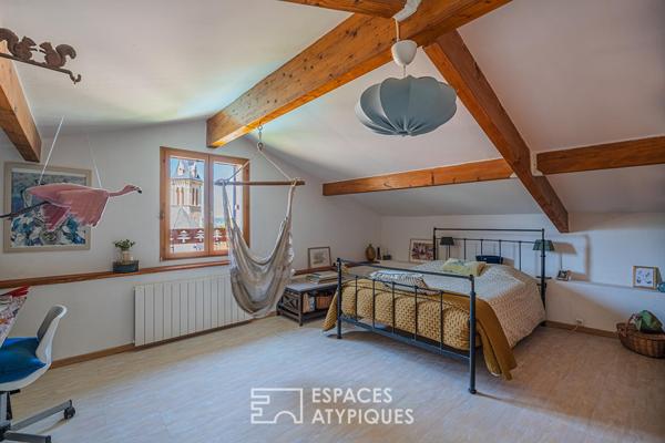 Maison de charme en pierre et son jardin secret en coeur de village