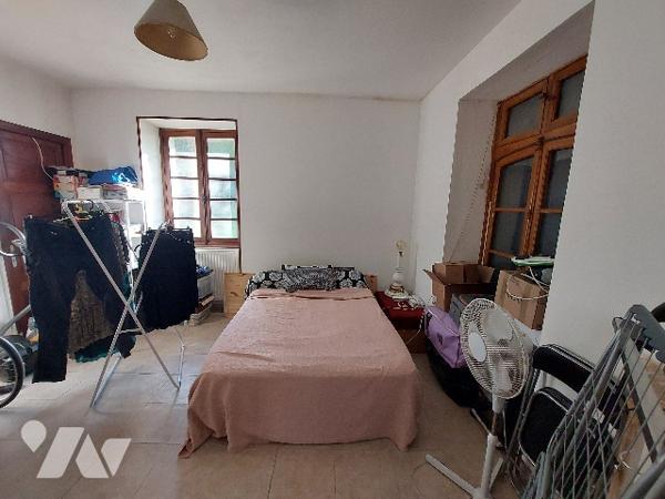 SAINT GAUDENS, proche centre-ville et commerces, ensemble immobilier composé de deux appartements.