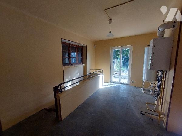 SAINT GAUDENS, proche centre-ville et commerces, ensemble immobilier composé de deux appartements.