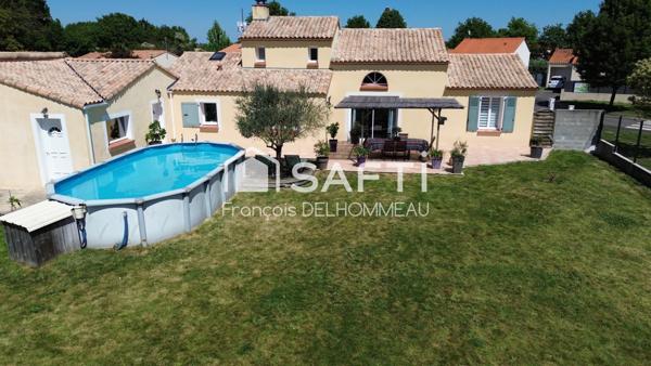 Maison de 141m2, 4 chambres, 1 bureau, garage sur une parcelle de 882m2