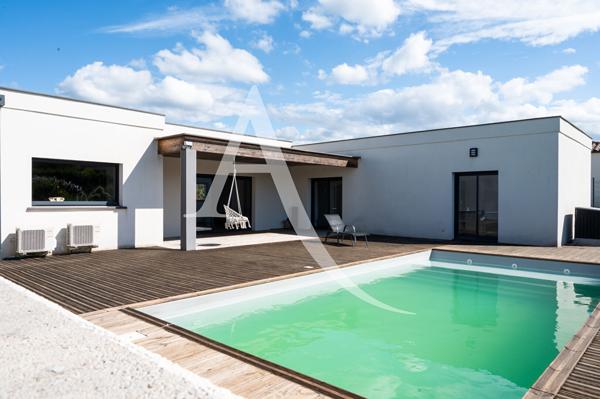 Maison récente avec jardin, piscine et dépendance proche Carcassonne