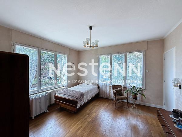 Grande maison T5 avec 3 chambres, un garage, une buanderie et une cave - 69500 BRON