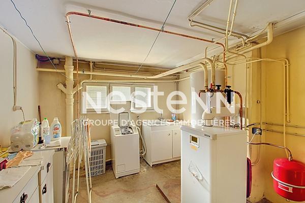 Grande maison T5 avec 3 chambres, un garage, une buanderie et une cave - 69500 BRON