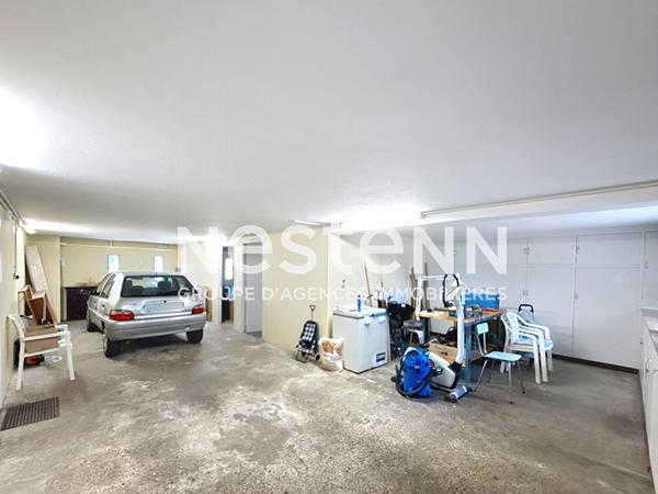 Grande maison T5 avec 3 chambres, un garage, une buanderie et une cave - 69500 BRON