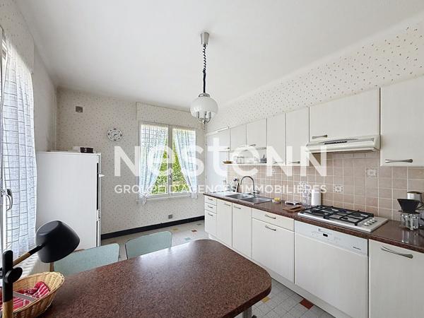 Grande maison T5 avec 3 chambres, un garage, une buanderie et une cave - 69500 BRON