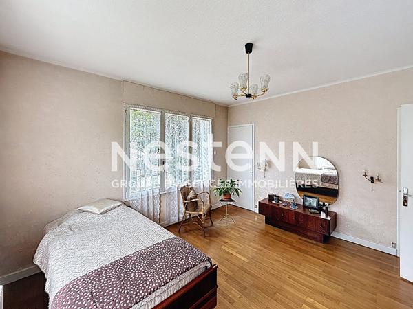 Grande maison T5 avec 3 chambres, un garage, une buanderie et une cave - 69500 BRON