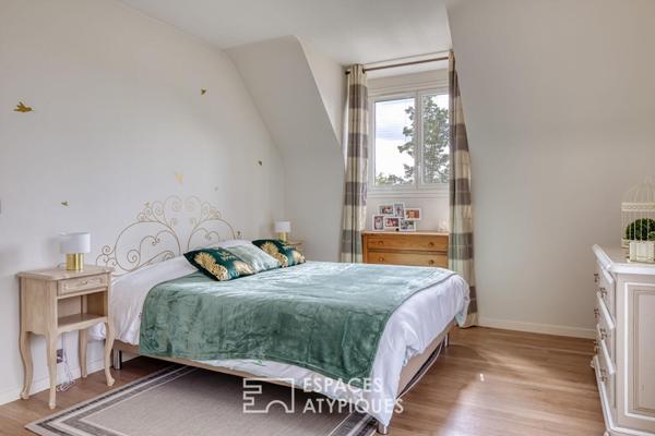 Maison familiale avec extension contemporaine et jardin paysager