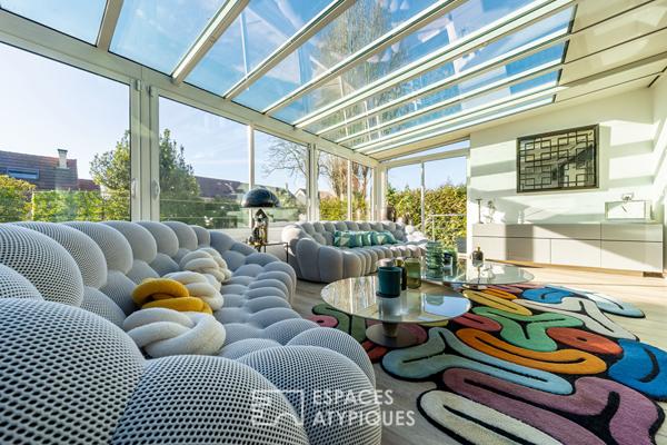 La maison contemporaine avec véranda et cave