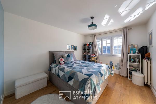 La maison contemporaine avec véranda et cave