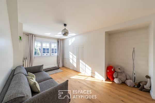 La maison contemporaine avec véranda et cave