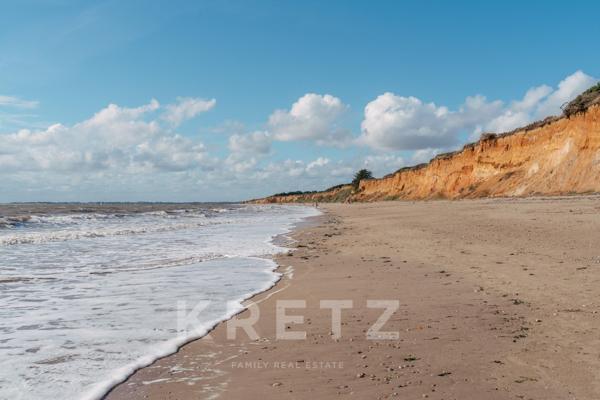 Maison ossature bois à pied des plages