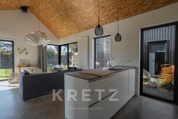 Maison ossature bois à pied des plages