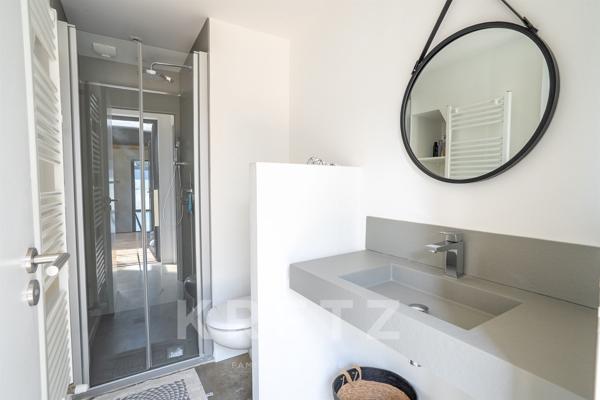 Maison ossature bois à pied des plages