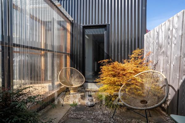 Maison ossature bois à pied des plages