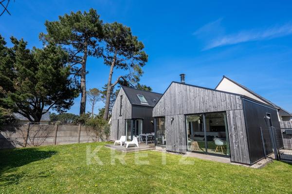 Maison ossature bois à pied des plages