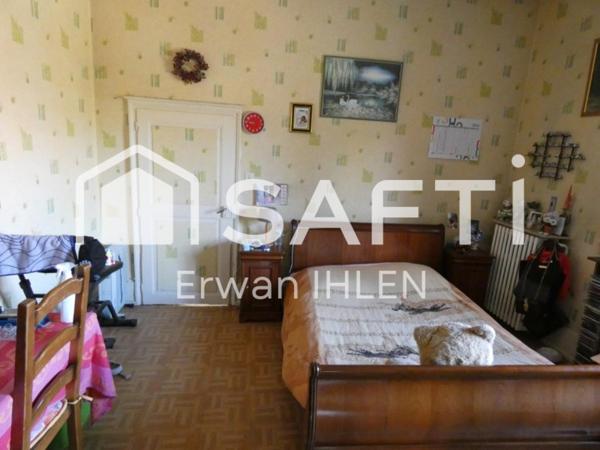 Appartement , 115 m²,5 pièces,4 chambres,salon cuisine,garage, dépendances et jardin.