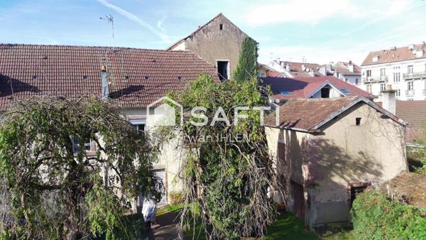 Appartement , 115 m²,5 pièces,4 chambres,salon cuisine,garage, dépendances et jardin.