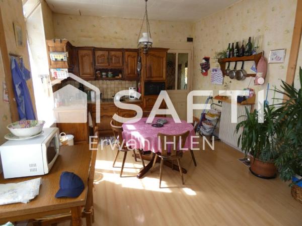 Appartement , 115 m²,5 pièces,4 chambres,salon cuisine,garage, dépendances et jardin.