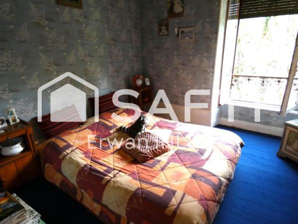 Appartement , 115 m²,5 pièces,4 chambres,salon cuisine,garage, dépendances et jardin.