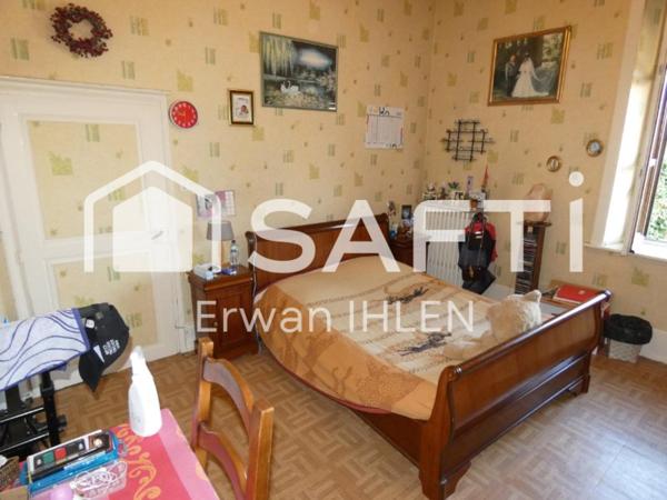 Appartement , 115 m²,5 pièces,4 chambres,salon cuisine,garage, dépendances et jardin.