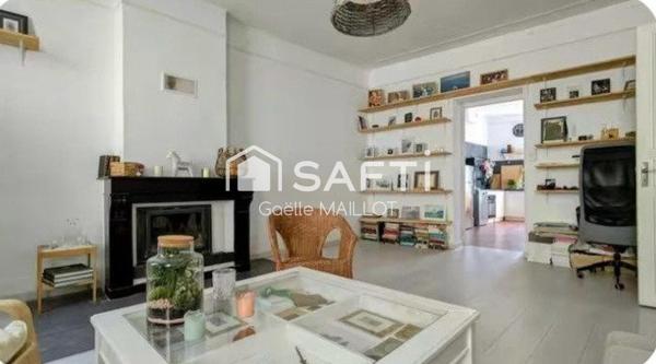Immeuble de 3 appartements avec jardin de 140m² .