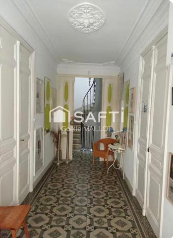 Immeuble de 3 appartements avec jardin de 140m² .
