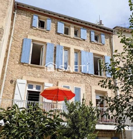 Immeuble de 3 appartements avec jardin de 140m² .