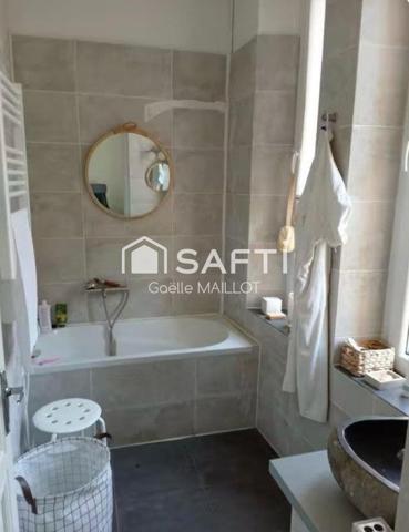 Immeuble de 3 appartements avec jardin de 140m² .