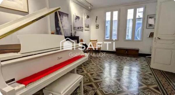Immeuble de 3 appartements avec jardin de 140m² .