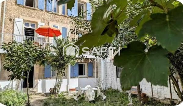 Immeuble de 3 appartements avec jardin de 140m² .
