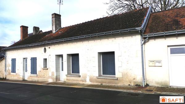 Maison d'habitation divisée en deux logements
