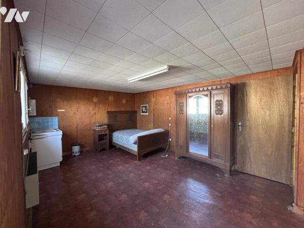 Maison ancienne en pierre au coeur du bourg