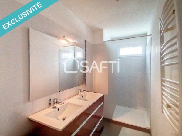 Appartement 3 chambres de 78 m² vendu loué - grande terrasse, parking, jardin partagé.