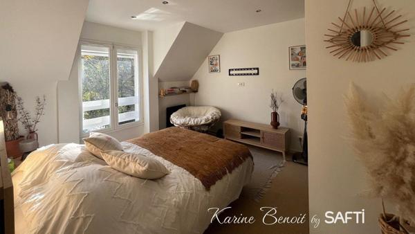 Maison d'archithecte avec une vue panoramique sur la Seine