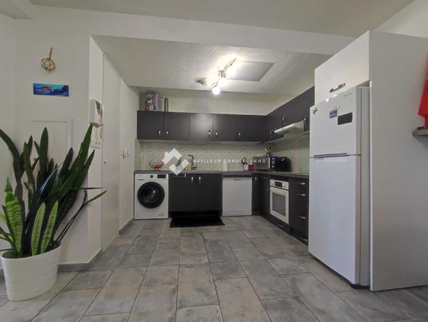 appartement T3 avec terrasse , patio et place de parking